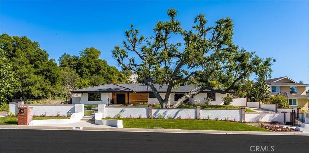 15776 Arbela Dr, Whittier, CA 90603 - view of front of home featuring a fenced front yard