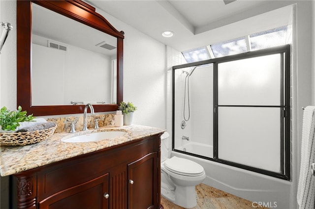 full bathroom featuring visible vents, toilet, enclosed tub / shower combo, and vanity