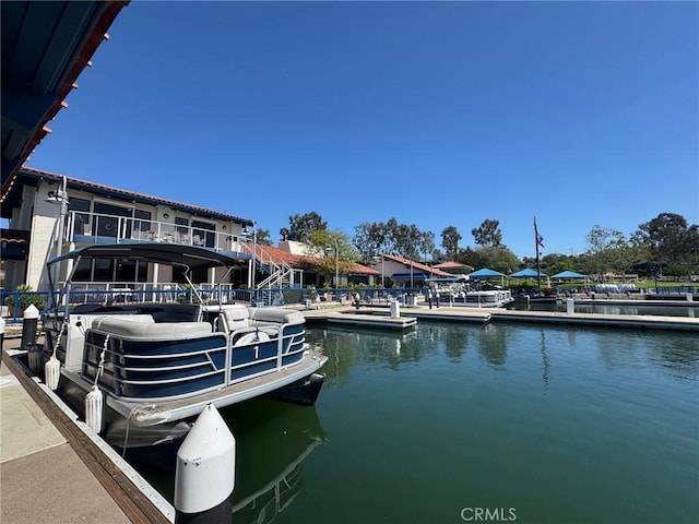 view of dock with a water view