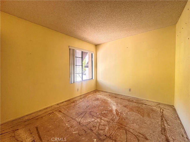 7 Wilderness Pl, Pomona, CA 91766 - spare room featuring a textured ceiling