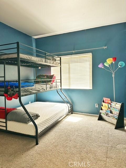 1380 Riverstone Ct, Hemet, CA 92545 - bedroom featuring baseboards and carpet