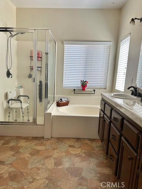 1380 Riverstone Ct, Hemet, CA 92545 - bathroom with a bath, vanity, and a stall shower