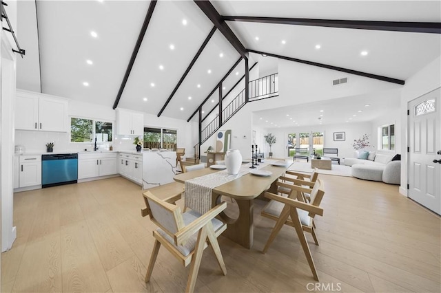 10321 Mcbroom St, Sunland, CA 91040 - dining area featuring high vaulted ceiling, beam ceiling, visible vents, and light wood-style floors