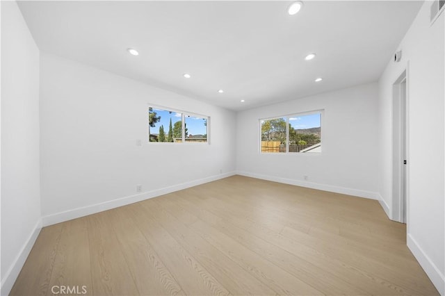 10321 Mcbroom St, Sunland, CA 91040 - unfurnished room featuring baseboards, recessed lighting, visible vents, and light wood-type flooring