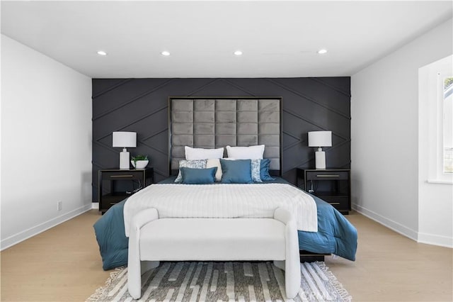 10321 Mcbroom St, Sunland, CA 91040 - bedroom featuring recessed lighting, vaulted ceiling, light wood-style floors, a decorative wall, and baseboards