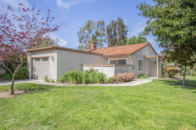 ranch-style house with a chimney, a front lawn, driveway, a garage, and stucco siding