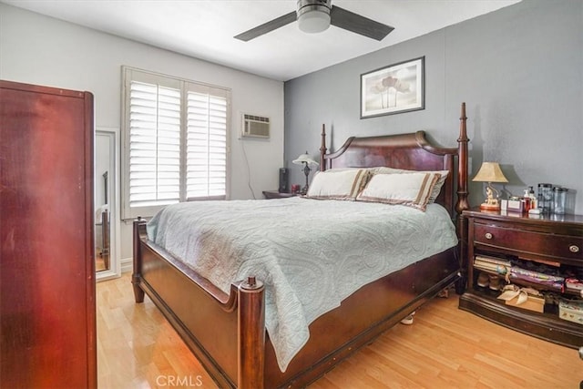 17274 Nisson Rd Unit A, Tustin, CA 92780 - bedroom with wood finished floors, a wall unit AC, and a ceiling fan