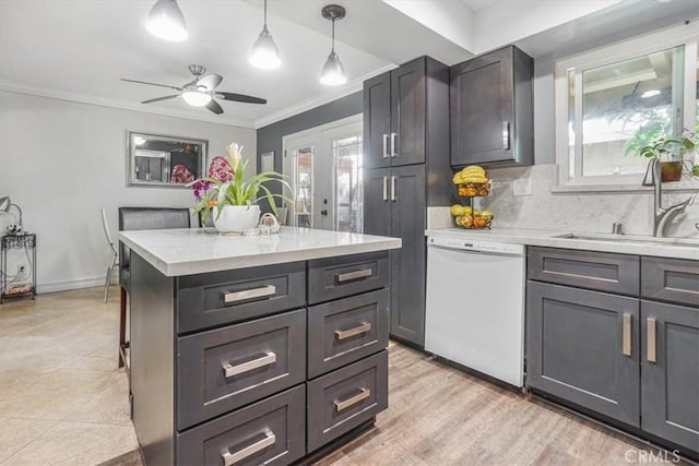 17274 Nisson Rd Unit A, Tustin, CA 92780 - kitchen featuring dishwasher, a sink, tasteful backsplash, crown molding, and a ceiling fan