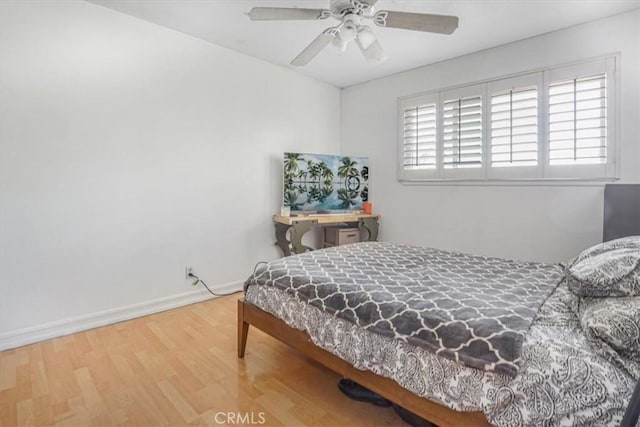 17274 Nisson Rd Unit A, Tustin, CA 92780 - bedroom featuring wood finished floors, baseboards, and a ceiling fan