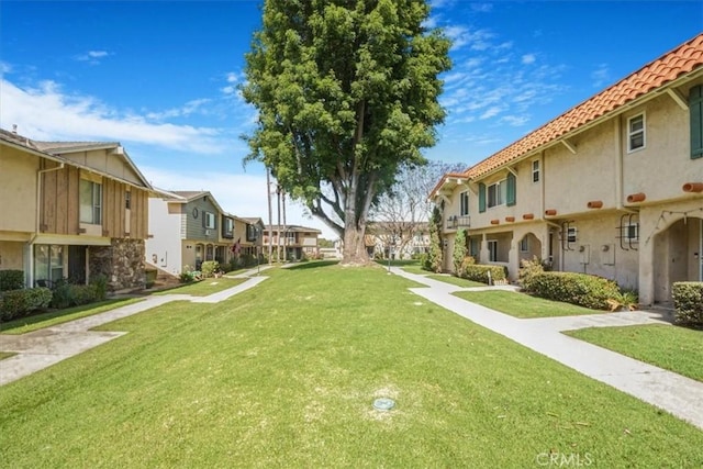 17274 Nisson Rd Unit A, Tustin, CA 92780 - view of property's community featuring a residential view and a lawn