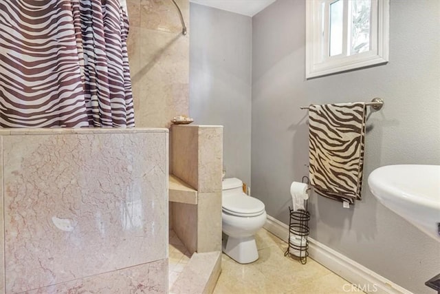 17274 Nisson Rd Unit A, Tustin, CA 92780 - full bathroom with toilet, tile patterned floors, baseboards, and curtained shower
