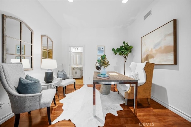 office area with baseboards, wood finished floors, visible vents, and recessed lighting