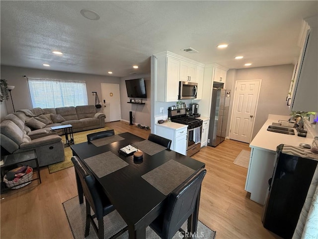 806 S Sandalwood Ave, Bloomington, CA 92316 - dining area featuring light wood-style flooring and recessed lighting