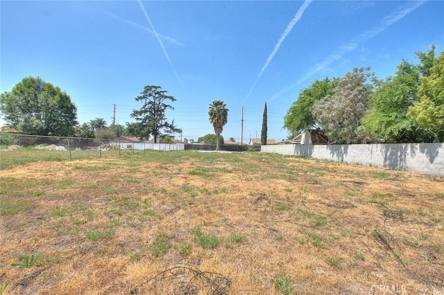 view of yard featuring fence
