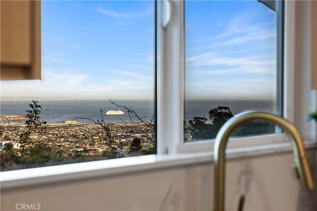 interior details featuring a water view