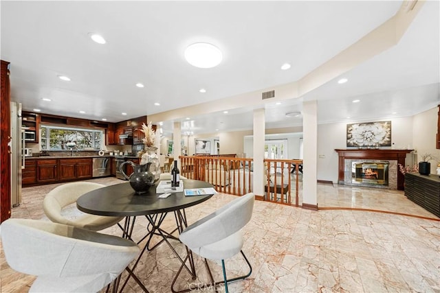 2177 W Silver Tree Rd, Claremont, CA 91711 - dining area featuring a premium fireplace, recessed lighting, healthy amount of natural light, baseboards, and light marble finish flooring
