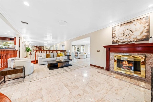 2177 W Silver Tree Rd, Claremont, CA 91711 - living area with a premium fireplace, marble look tile flooring, crown molding, baseboards, and recessed lighting