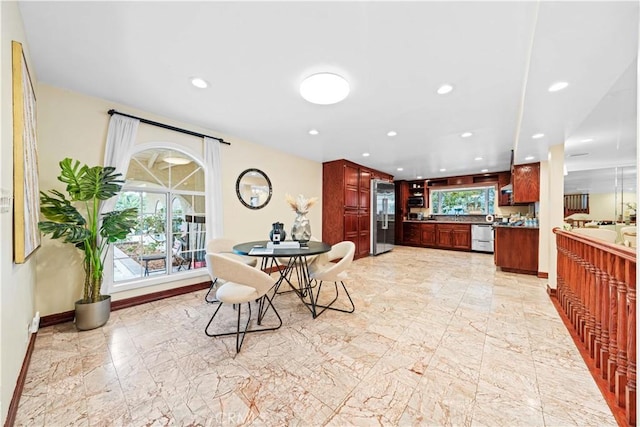 2177 W Silver Tree Rd, Claremont, CA 91711 - dining space featuring light marble finish floors, plenty of natural light, recessed lighting, and baseboards