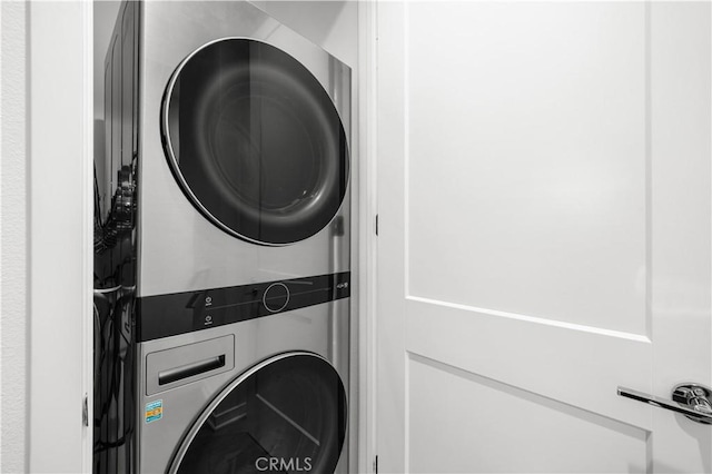 207 Colby Cir, Claremont, CA 91711 - laundry room with stacked washer / drying machine and laundry area