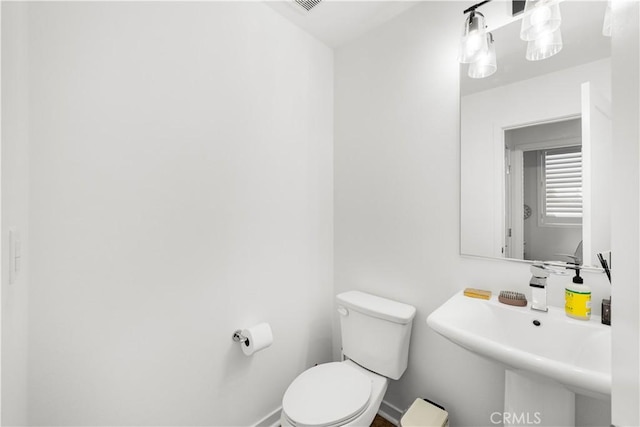 207 Colby Cir, Claremont, CA 91711 - bathroom with baseboards, toilet, and a sink