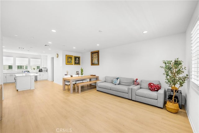 207 Colby Cir, Claremont, CA 91711 - living area with light wood-type flooring, recessed lighting, and healthy amount of natural light