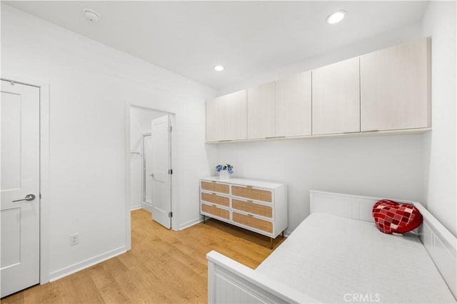 207 Colby Cir, Claremont, CA 91711 - laundry area with recessed lighting, baseboards, and light wood-type flooring