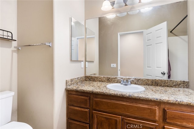 27674 Blue Topaz Dr, Menifee, CA 92585 - bathroom with toilet, vanity, and a shower