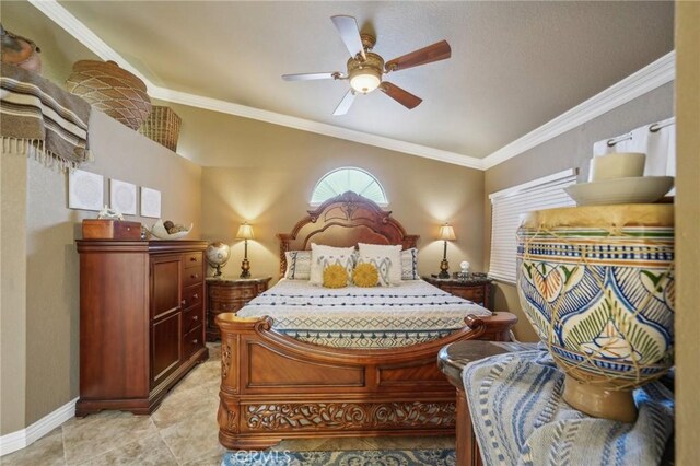 bedroom with ornamental molding, vaulted ceiling, a ceiling fan, and baseboards