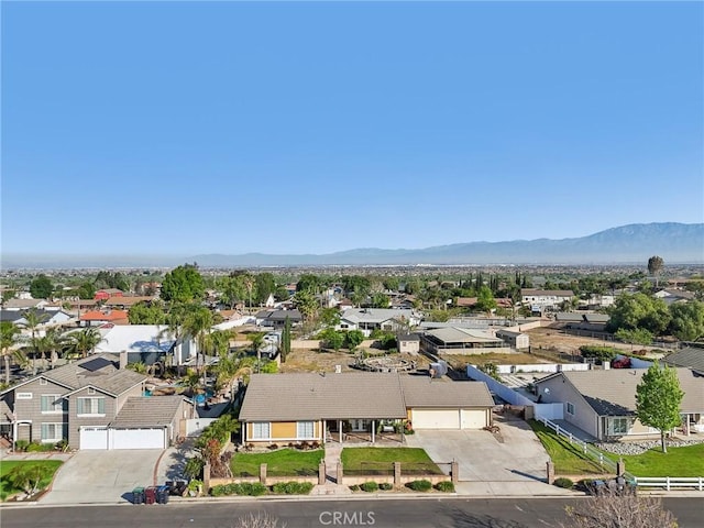 aerial view with a mountain view and a residential view