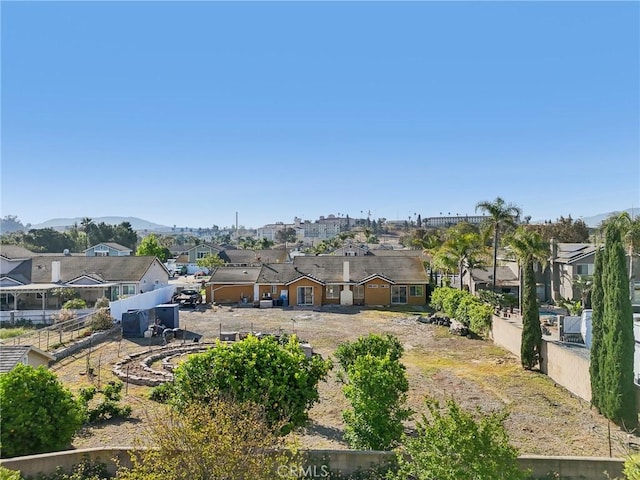 bird's eye view with a mountain view and a residential view