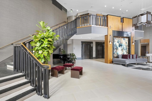 700 W Harbor Dr Unit 402, San Diego, CA 92101 - common area featuring a high ceiling, stairway, and recessed lighting