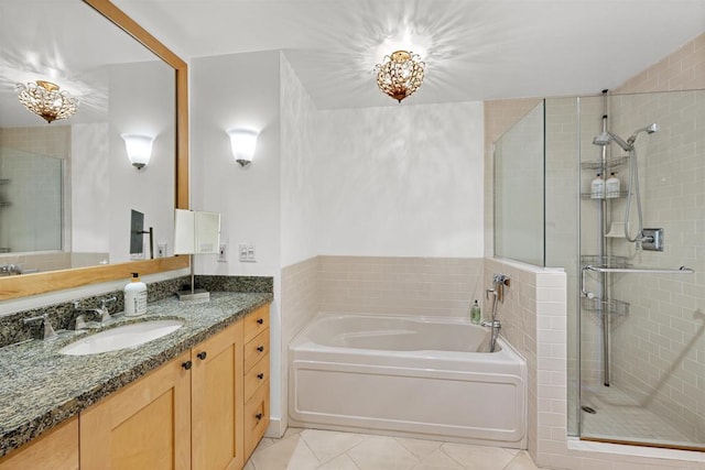 700 W Harbor Dr Unit 402, San Diego, CA 92101 - bathroom featuring a garden tub, vanity, a stall shower, and tile patterned floors