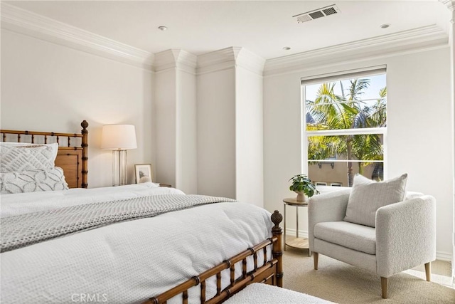 carpeted bedroom with visible vents and ornamental molding