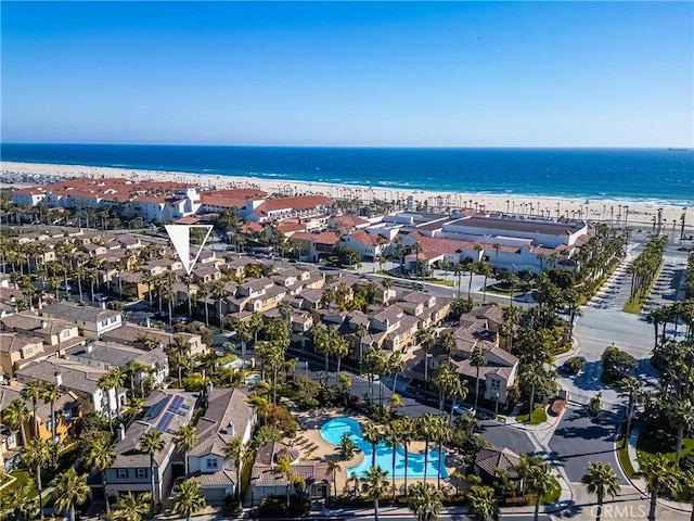 bird's eye view with a water view and a residential view