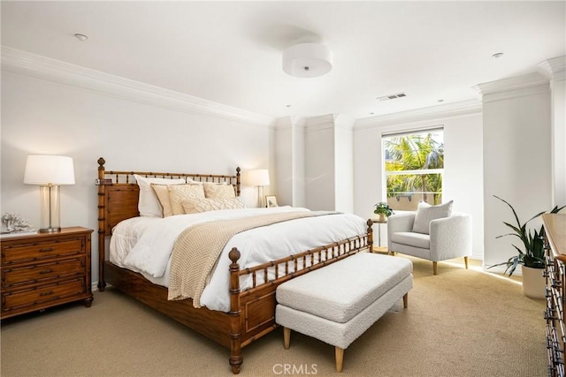 bedroom featuring visible vents, crown molding, and light colored carpet