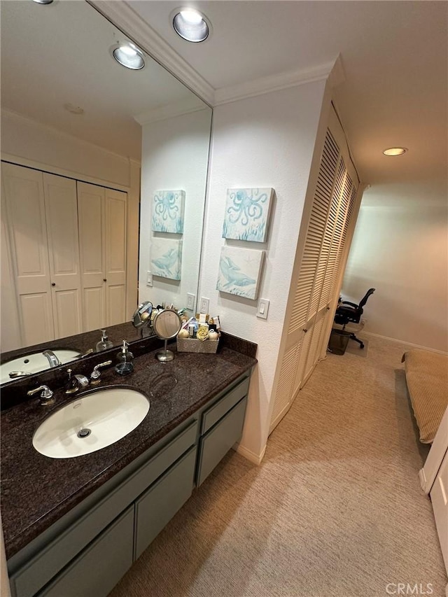 1007 S Catalina Ave Unit 212, Redondo Beach, CA 90277 - bathroom with ornamental molding, vanity, baseboards, and recessed lighting