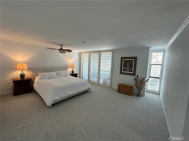 1007 S Catalina Ave Unit 212, Redondo Beach, CA 90277 - carpeted bedroom featuring crown molding, ceiling fan, and baseboards