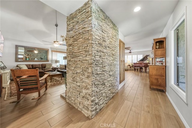hallway featuring light wood-style floors