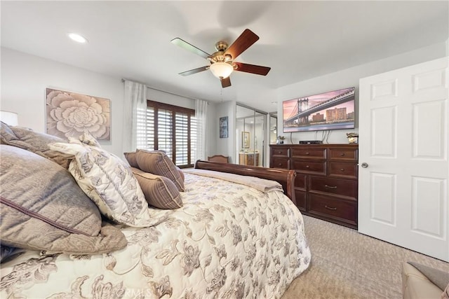 bedroom with ceiling fan, recessed lighting, and light colored carpet