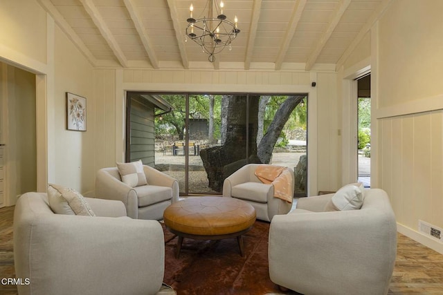 living area featuring wood finished floors, a chandelier, vaulted ceiling with beams, wooden ceiling, and visible vents