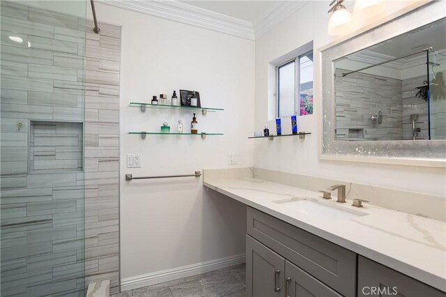 full bathroom with walk in shower, baseboards, vanity, and ornamental molding