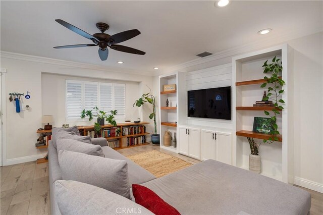 living room featuring visible vents, baseboards, recessed lighting, ceiling fan, and crown molding