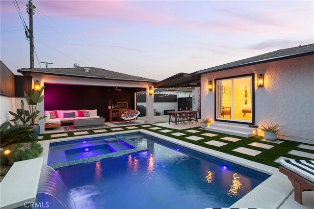 view of pool featuring a patio area, an outdoor hangout area, outdoor dry bar, and a pool with connected hot tub