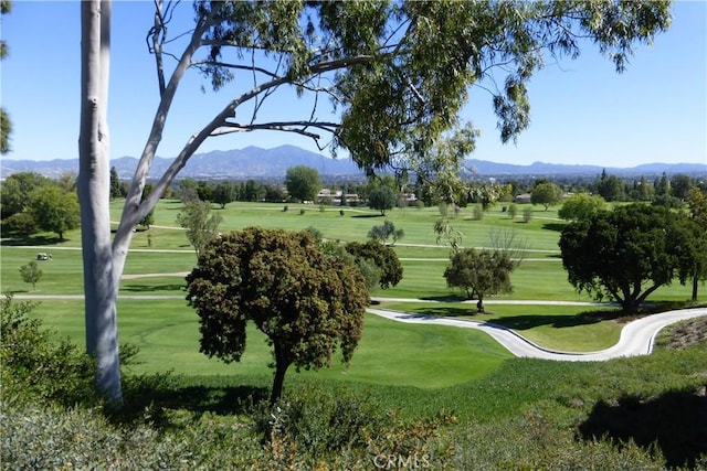 2119 Via Puerta Unit U, Laguna Woods, CA 92637 - surrounding community featuring a yard, a mountain view, and view of golf course