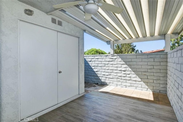 2119 Via Puerta Unit U, Laguna Woods, CA 92637 - exterior details featuring a ceiling fan