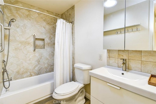 2119 Via Puerta Unit U, Laguna Woods, CA 92637 - full bathroom featuring tasteful backsplash, toilet, vanity, and shower / bathtub combination with curtain