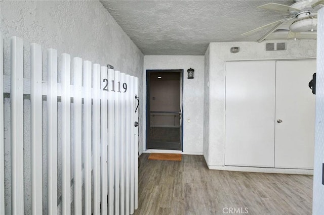 2119 Via Puerta Unit U, Laguna Woods, CA 92637 - entrance to property featuring a ceiling fan and visible vents