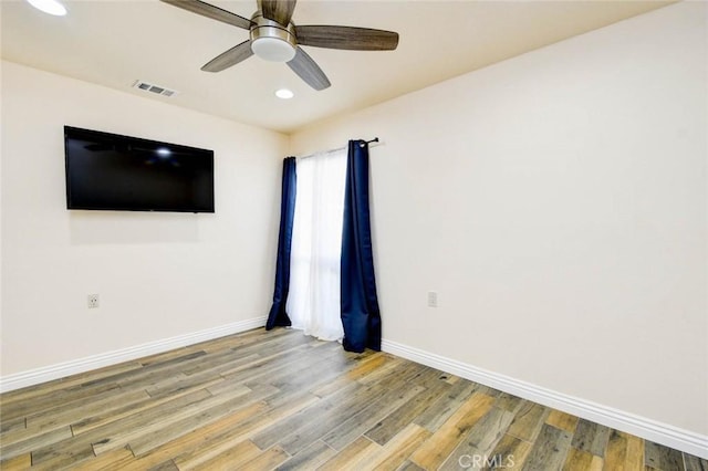 2119 Via Puerta Unit U, Laguna Woods, CA 92637 - empty room featuring light wood-type flooring, ceiling fan, baseboards, visible vents, and recessed lighting