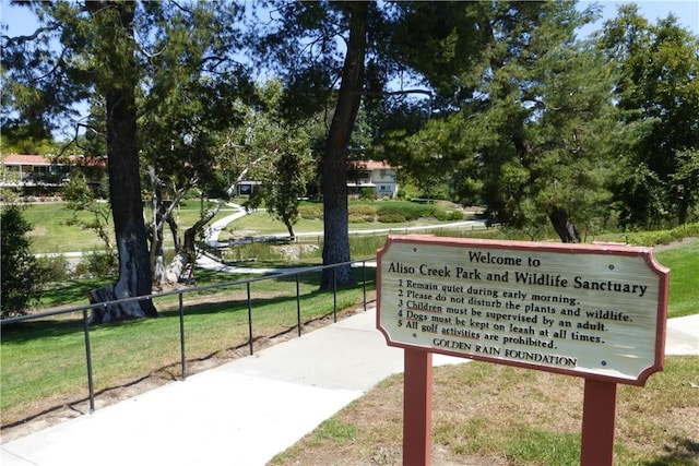 2119 Via Puerta Unit U, Laguna Woods, CA 92637 - surrounding community with fence and a yard