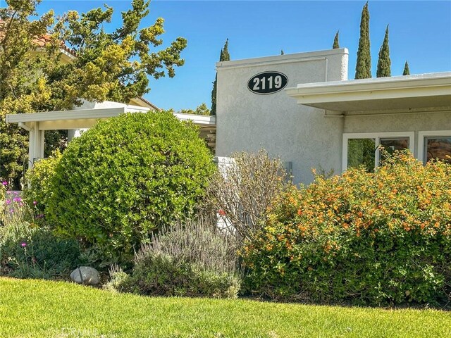 2119 Via Puerta Unit U, Laguna Woods, CA 92637 - view of home's exterior with stucco siding